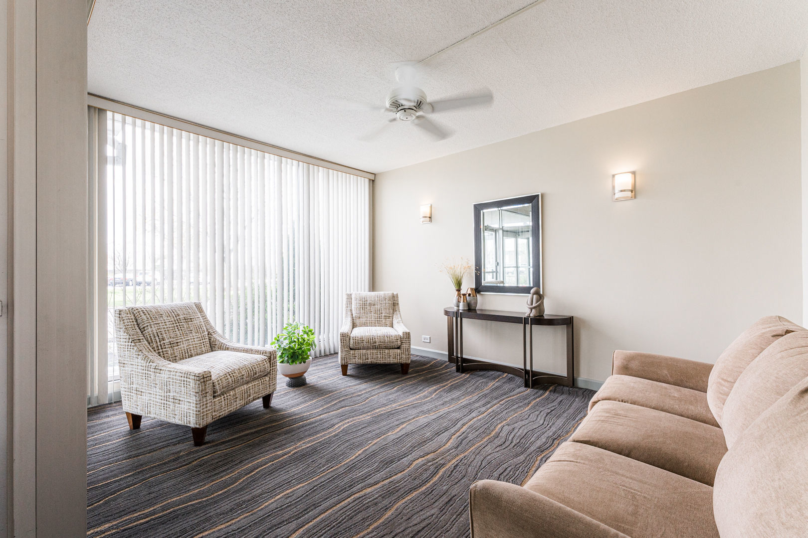 8801 Golf Road, Unit 10D Niles, IL 60714 - Photo 4 of 24 a living room with furniture and wooden floor