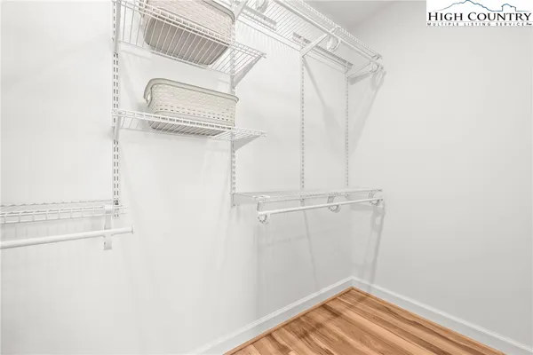 a view of a room with racks on the wall