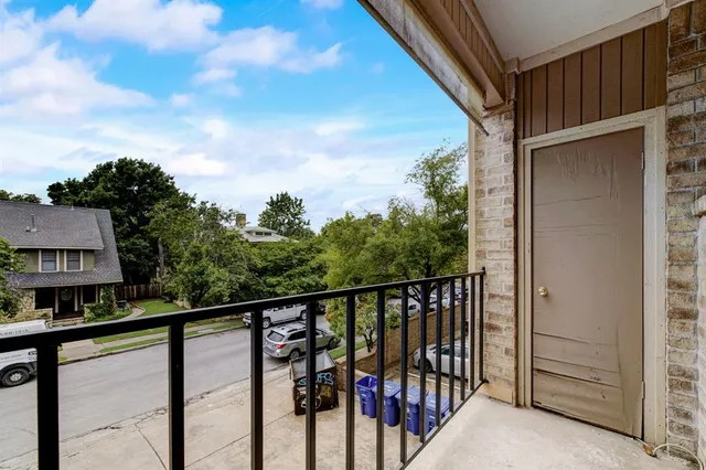 a view of a balcony with an outdoor space