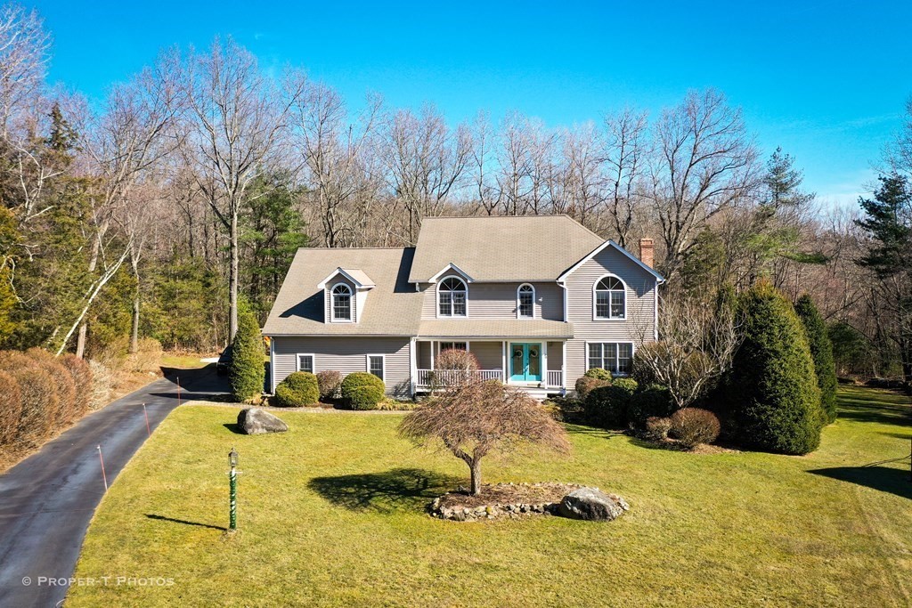 20 Warren Road Wilbraham, MA 01095 - Photo 1 of 41 a front view of a house with a yard