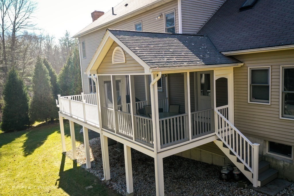 20 Warren Road Wilbraham, MA 01095 - Photo 20 of 41 a view of a house with backyard and deck