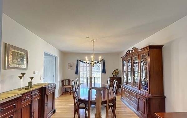 20 Warren Road Wilbraham, MA 01095 - Photo 8 of 41 a view of a a dining room with furniture window and wooden floor