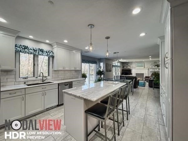 20 Warren Road Wilbraham, MA 01095 - Photo 10 of 41 a kitchen with a table and chairs in it