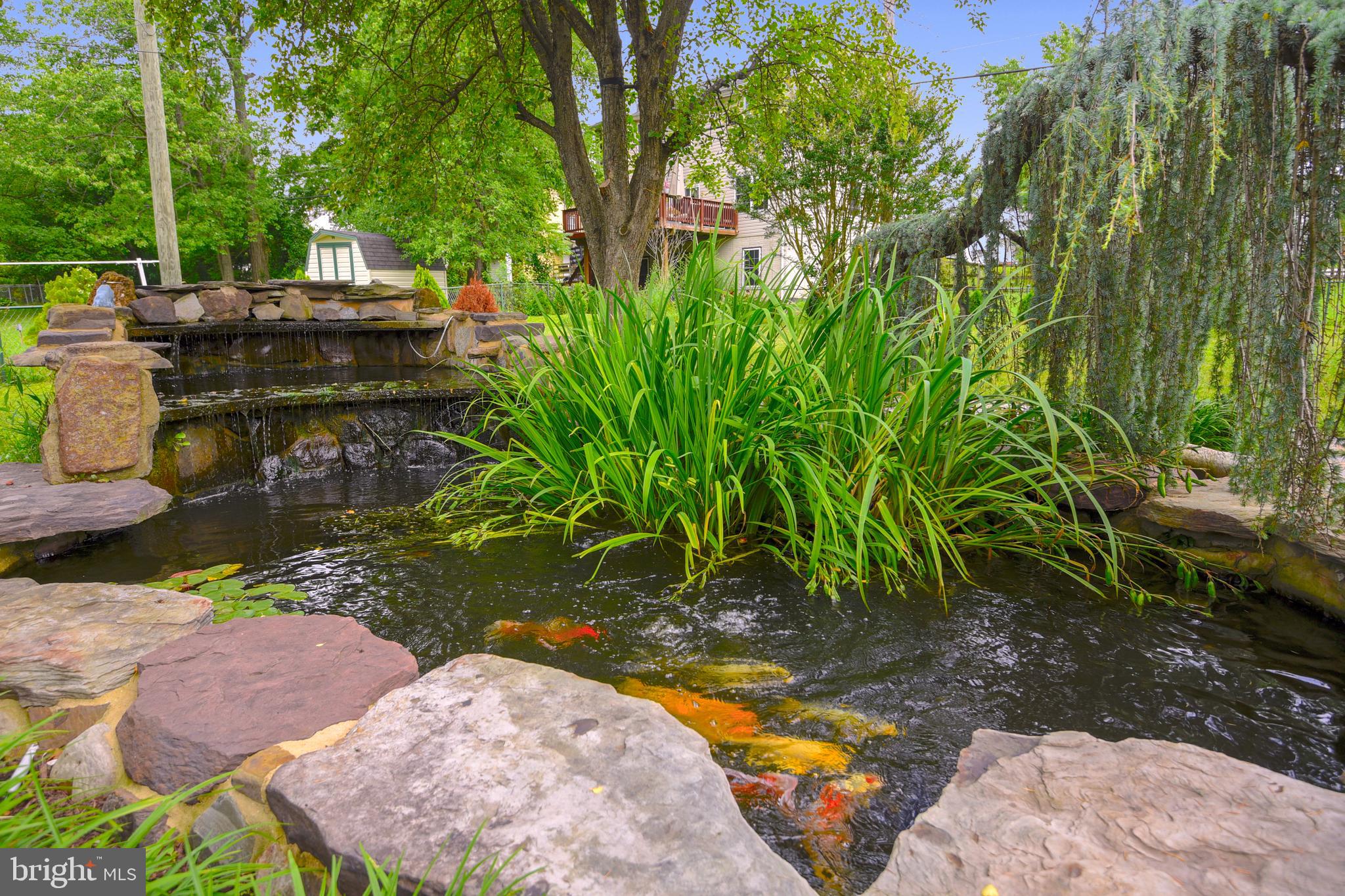 2506 Harwood Road Baltimore, MD 21234 - Photo 25 of 29 Koi Pond with Waterfall