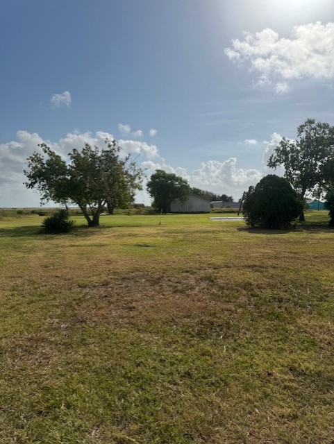93 2nd Street Palacios, TX 77465 - Photo 16 of 24 a view of an ocean and beach