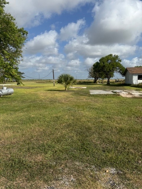 93 2nd Street Palacios, TX 77465 - Photo 6 of 24 a view of an ocean and beach