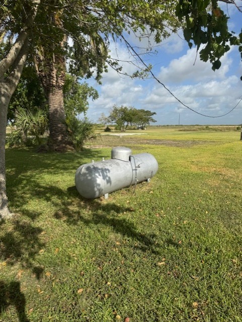 93 2nd Street Palacios, TX 77465 - Photo 7 of 24 a view of a outdoor space with a lake view