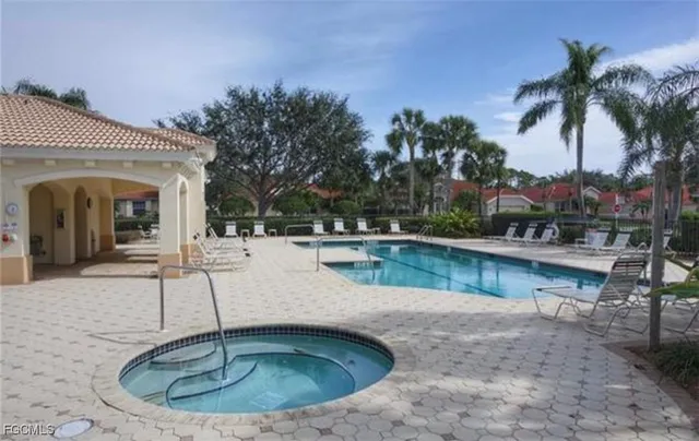 a view of a swimming pool with an outdoor space