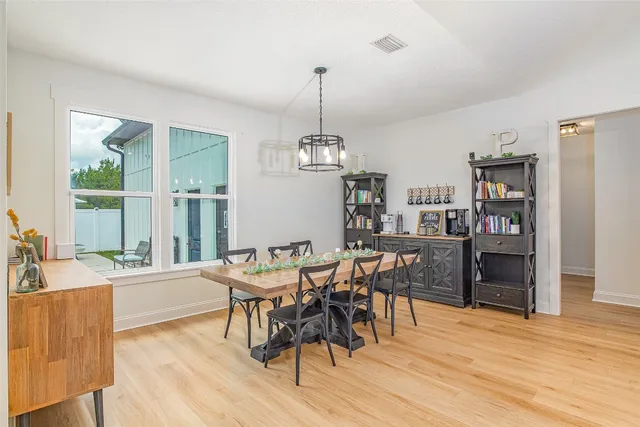 a bedroom with a bed and a chair