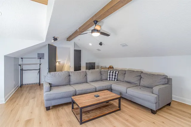 a view of a swimming pool and lounge chair