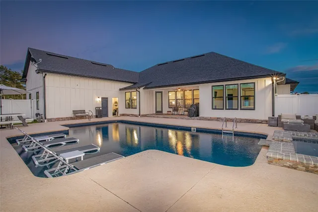 a view of a swimming pool with an ocean beach