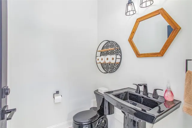 a view of a yard with a lake view