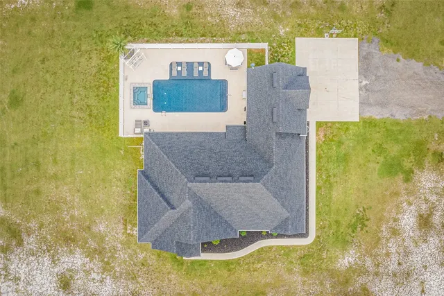 a view of swimming pool from a yard