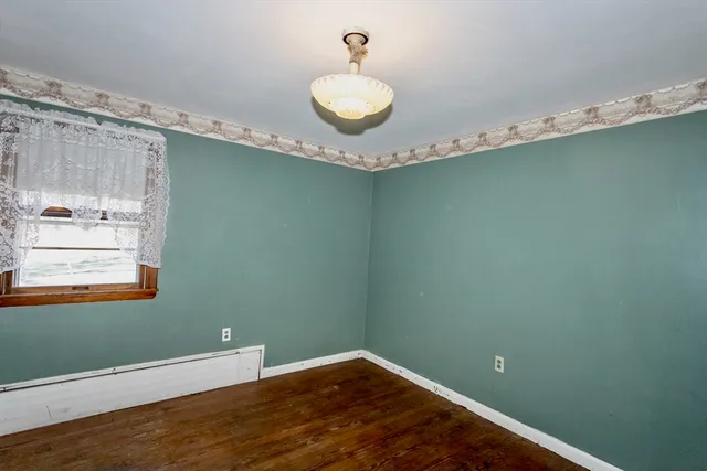 a view of a hallway with a chandelier