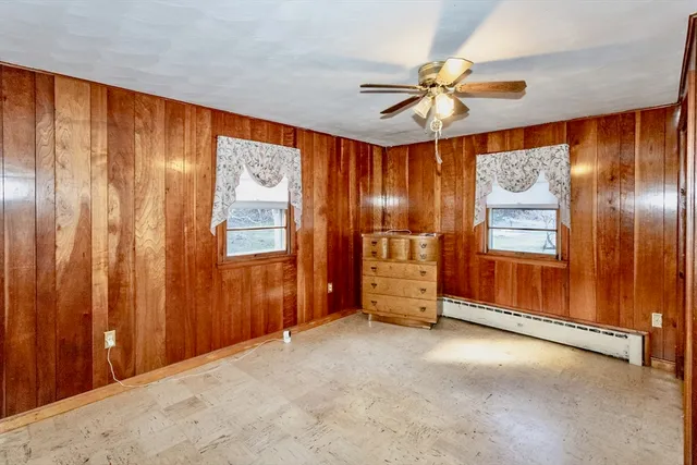 a view of an entryway with a mirror