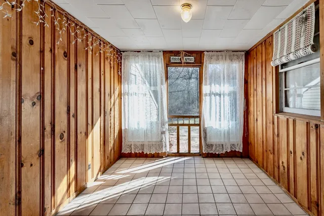a view of outdoor space with wooden door