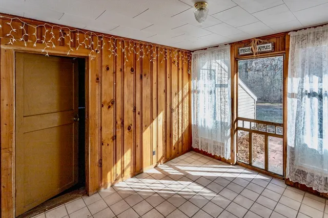 a view of an entryway with a front door