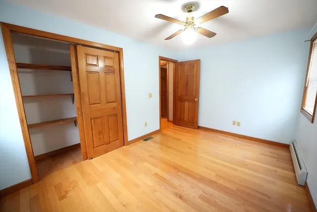 a bathroom with a double vanity sink and mirror