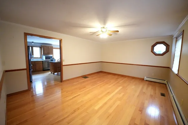a kitchen with stainless steel appliances granite countertop a sink stove and microwave