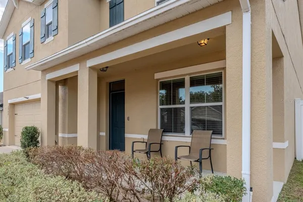 a house view with a outdoor space