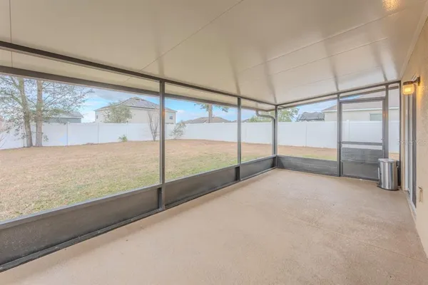 a view of a house with a small yard