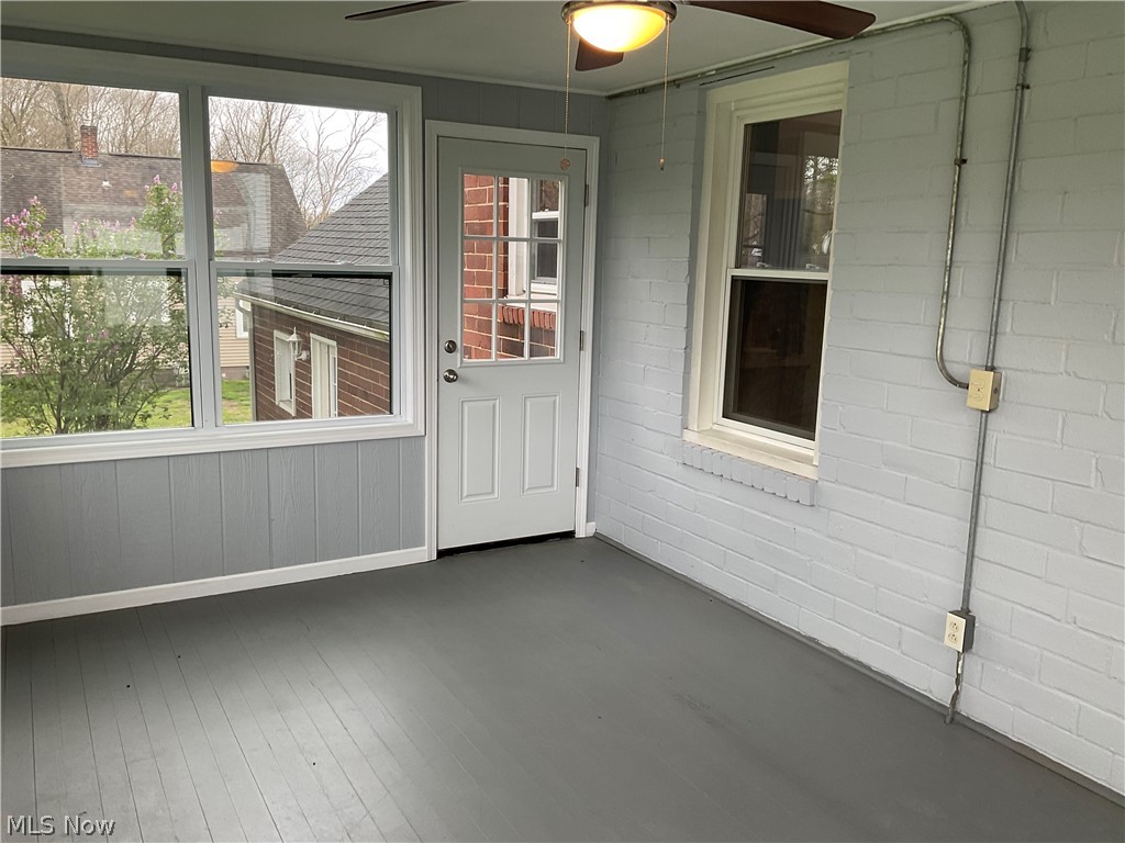 3475 South Turner Road Canfield, OH 44406 - Photo 26 of 33 Unfurnished sunroom featuring ceiling fan