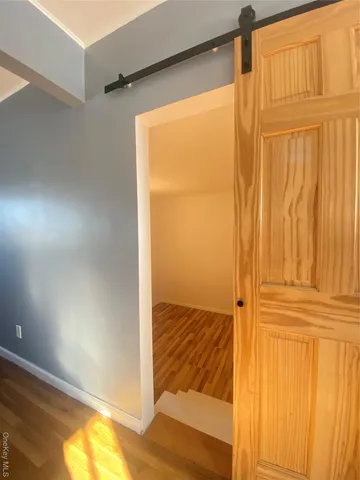 a kitchen with stainless steel appliances a refrigerator and a stove