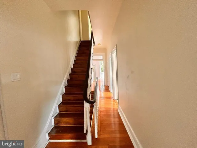 a view of entryway with wooden floor