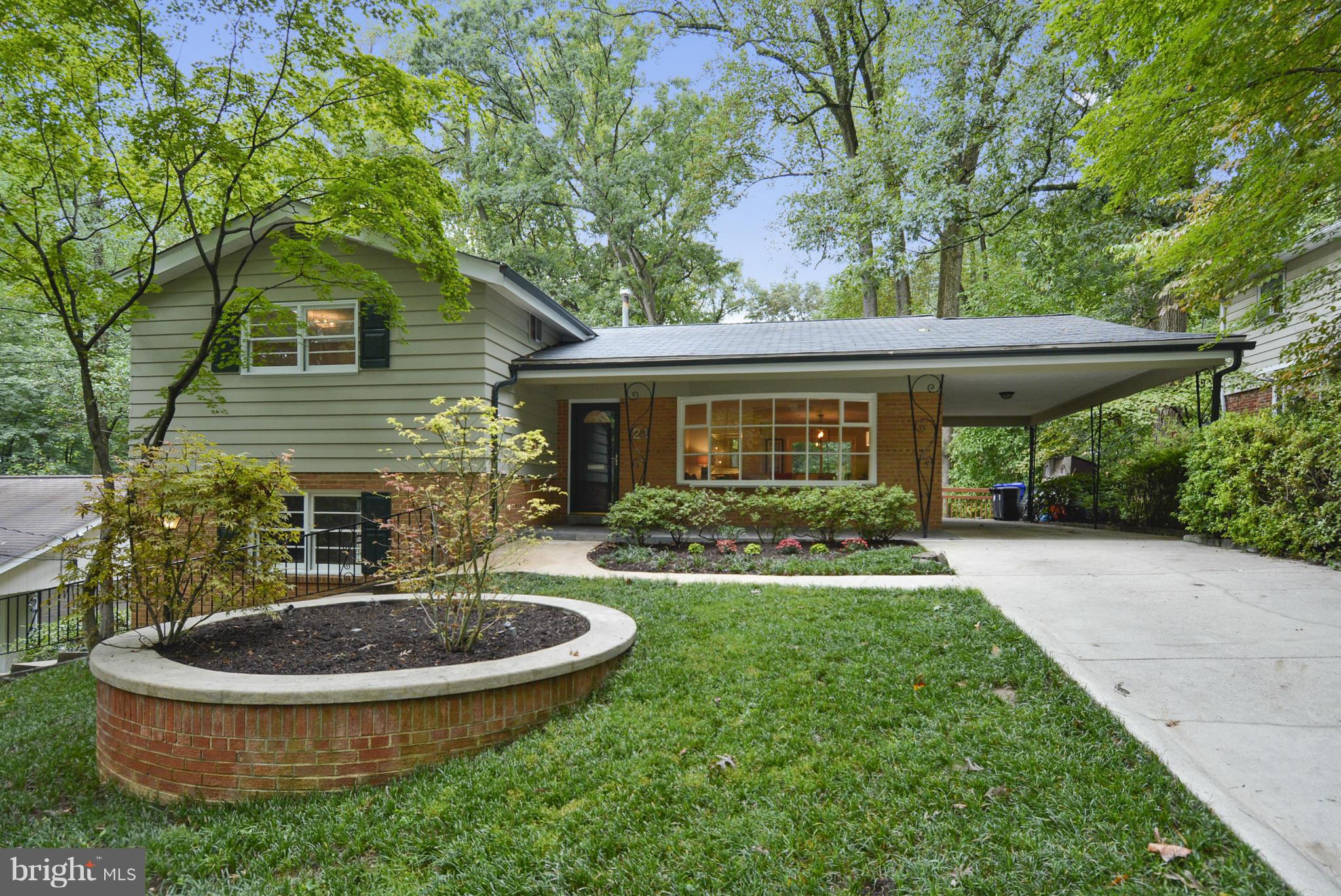 21 Parkside Road Silver Spring, MD 20910 - Photo 1 of 29 a view of a house with backyard sitting area and garden