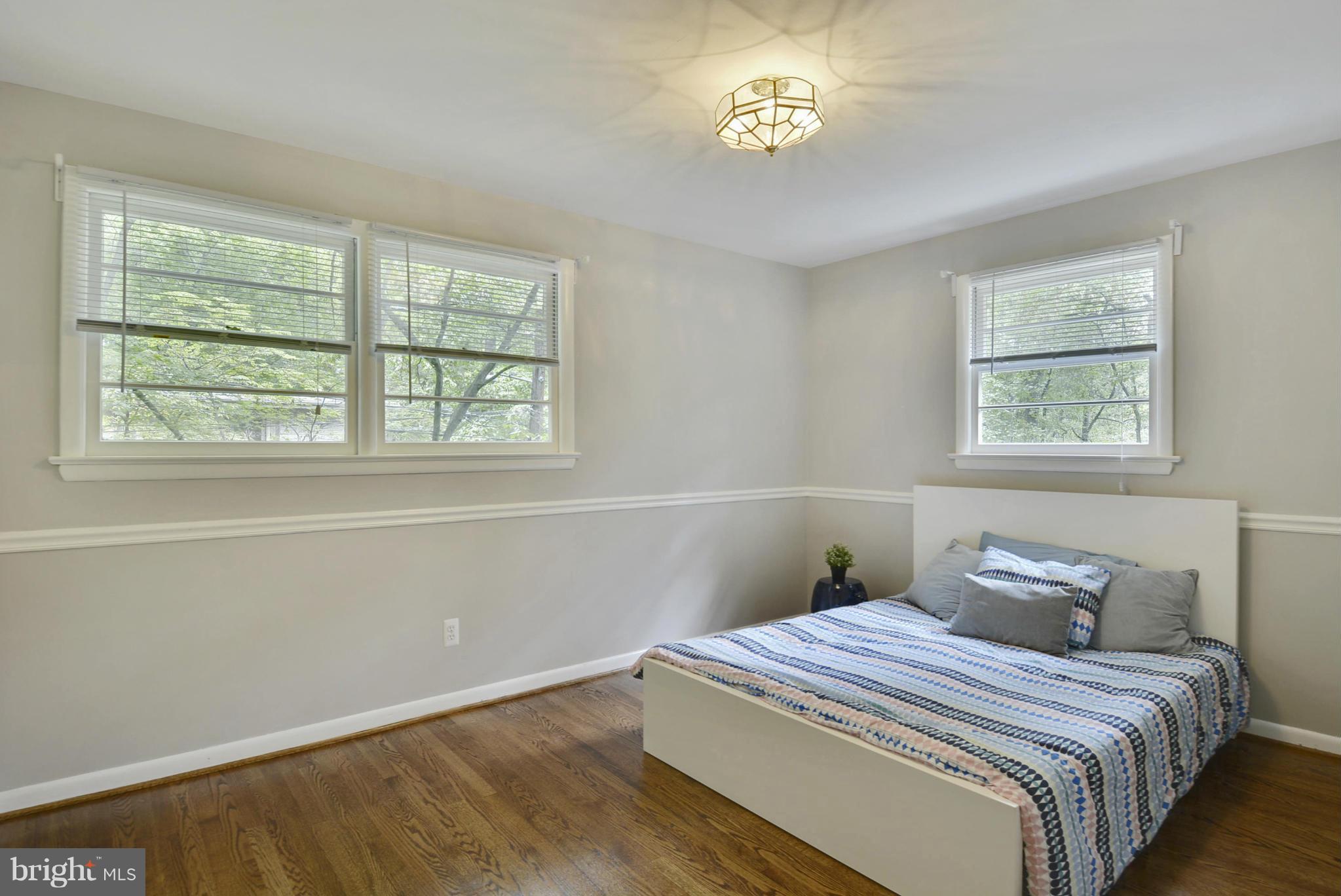 21 Parkside Road Silver Spring, MD 20910 - Photo 14 of 29 a bedroom with a bed and a window