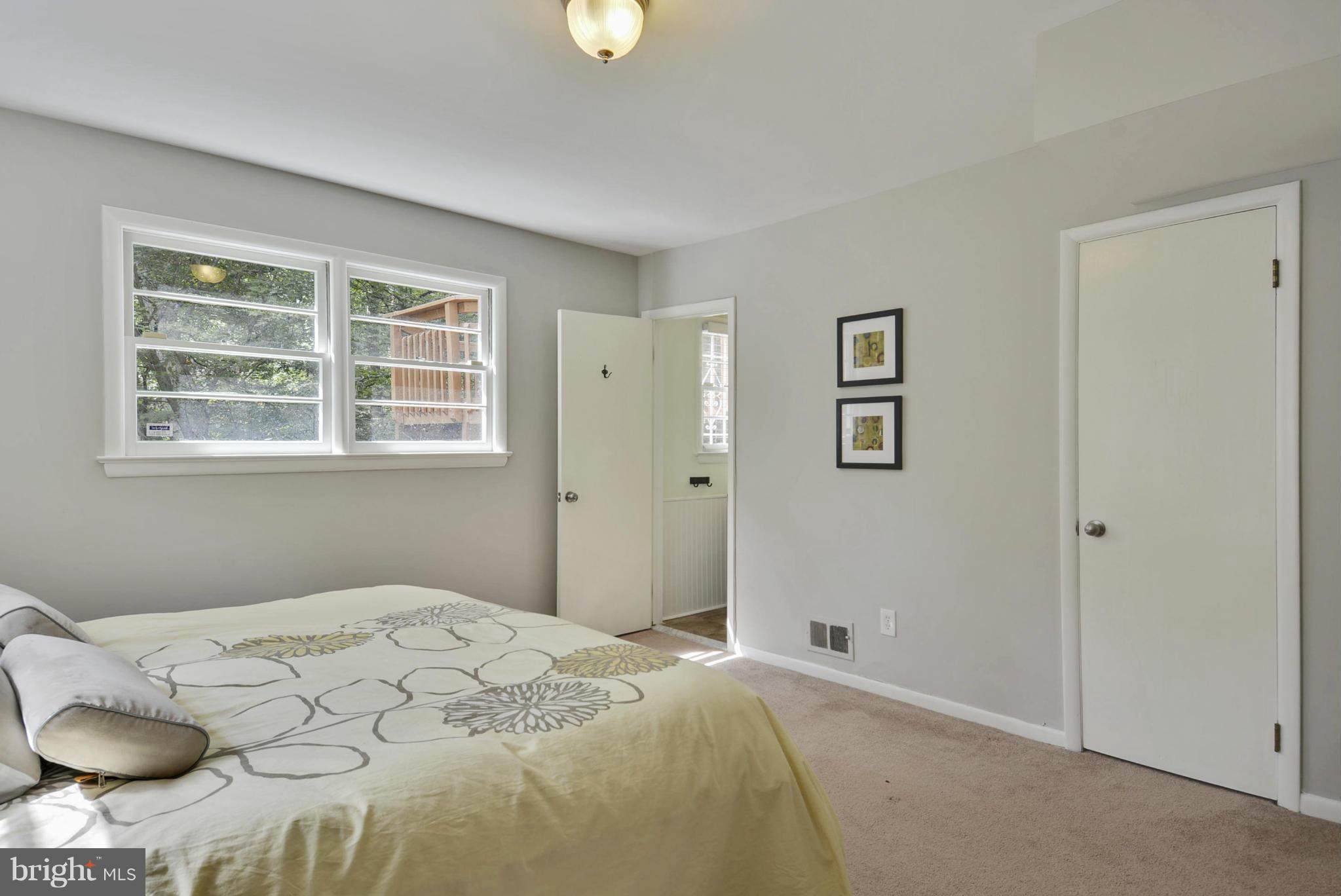 21 Parkside Road Silver Spring, MD 20910 - Photo 17 of 29 a bedroom with a bed and a window