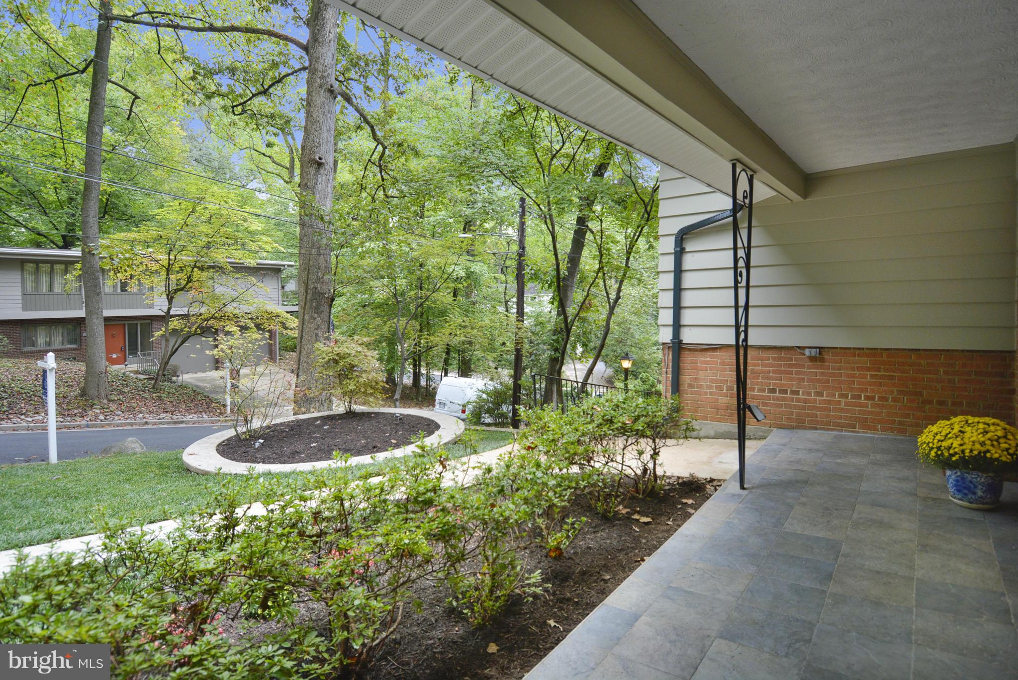 21 Parkside Road Silver Spring, MD 20910 - Photo 23 of 29 a view of a backyard with table and chairs and potted plants