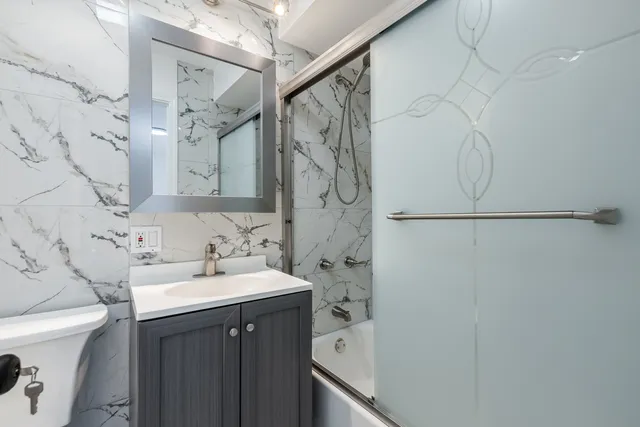 a view of bathroom with a sink and a toilet