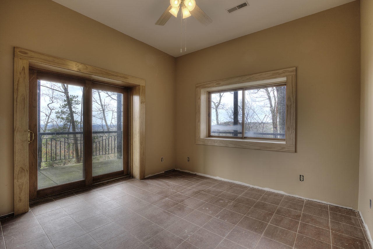 2602 Sharpes Ridge Way Sevierville, TN 37876 - Photo 19 of 28 a view of an empty room with a window