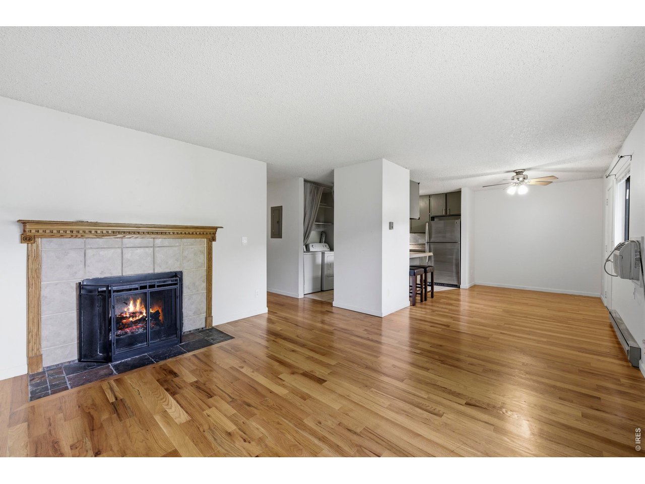 925 Columbia Road, Unit 824 Fort Collins, CO 80525 - Photo 5 of 36 a view of an empty room with a fireplace