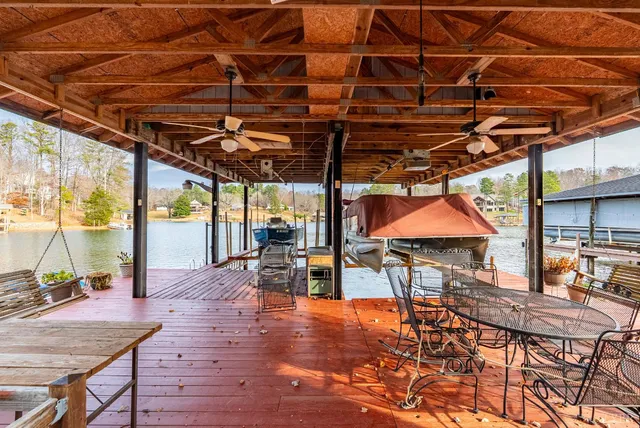 a view of a swimming pool with a patio