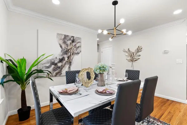 a living room with furniture wooden floor and a fireplace