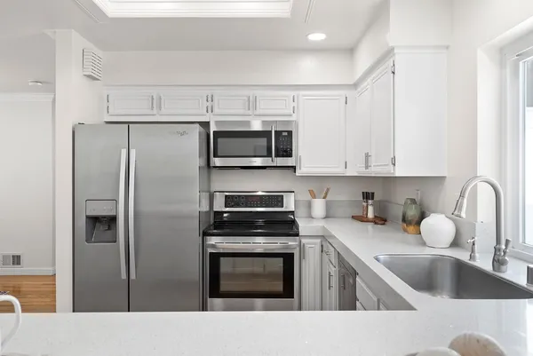 a view of a workspace with furniture