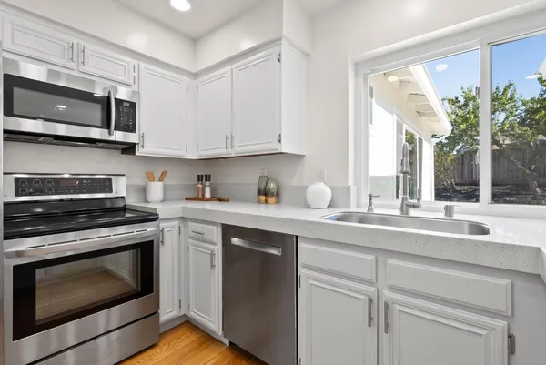 a bedroom with a bed and couch