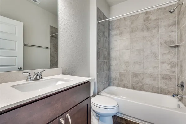 a bathroom with a sink and a bathtub