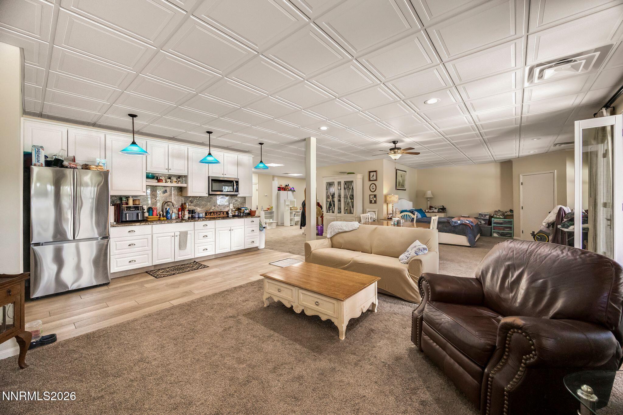 250 Jacks Valley Ranch Road Carson City, NV 89705 - Photo 23 of 44 a living room with furniture and a counter top space