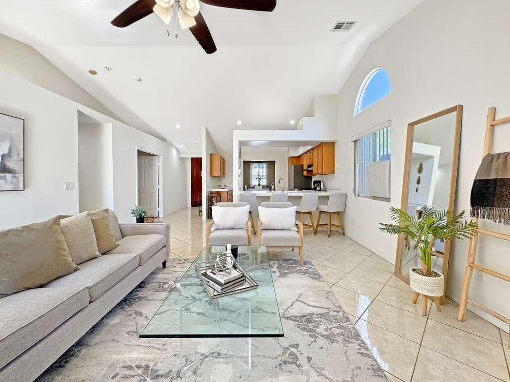 67755 Ontina Road Cathedral City, CA 92234 - Photo 16 of 30 a living room with furniture kitchen view and a dining table