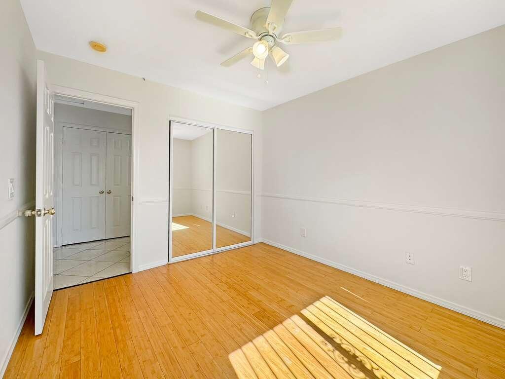 67755 Ontina Road Cathedral City, CA 92234 - Photo 22 of 30 a bedroom with a bed and a chandelier