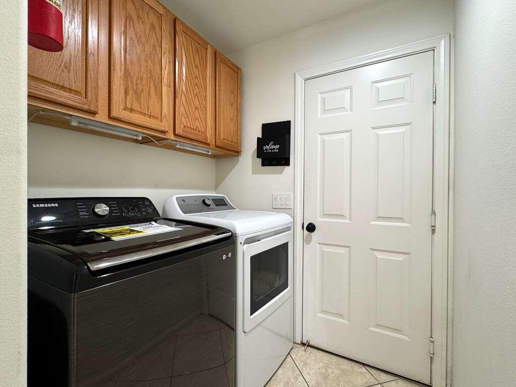 67755 Ontina Road Cathedral City, CA 92234 - Photo 26 of 30 a kitchen with stainless steel appliances granite countertop a stove and a microwave