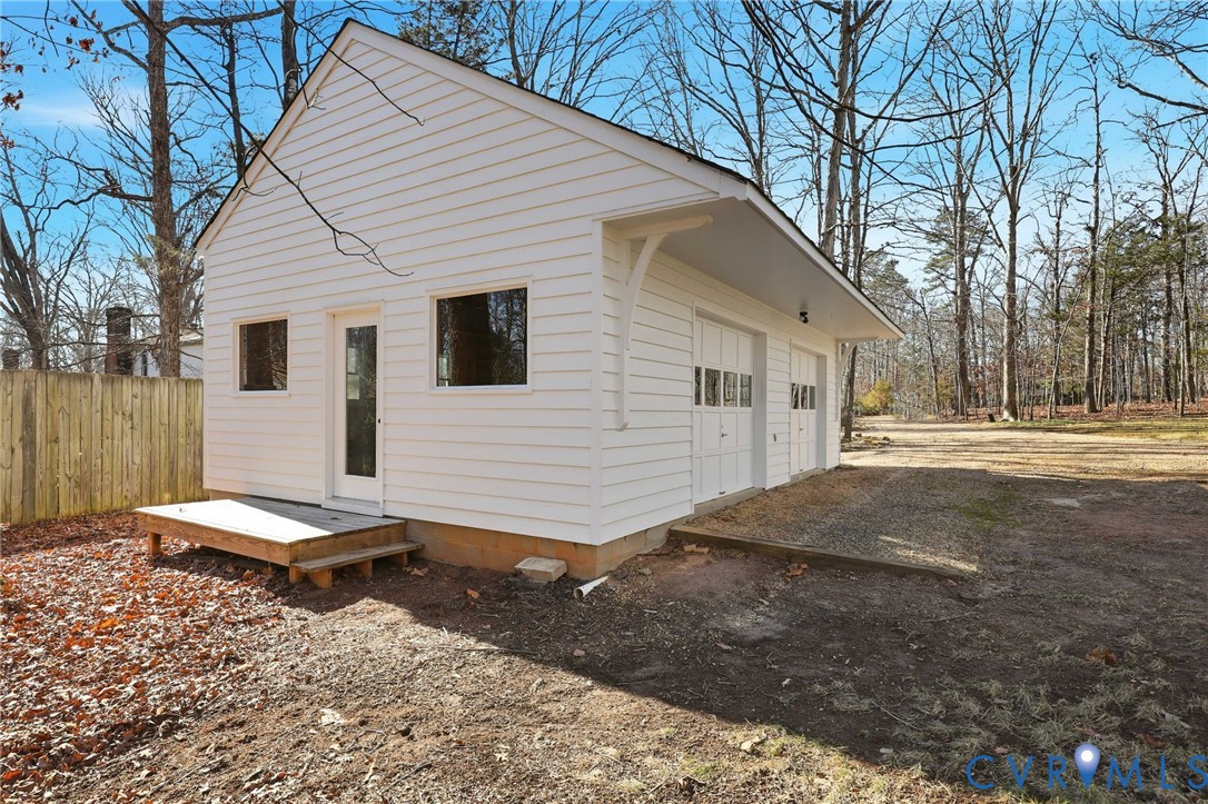 3264 Sherwood Ridge Way Powhatan, VA 23139 - Photo 34 of 40 a view of a house with a yard