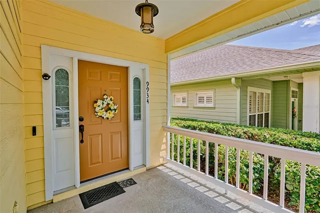 a front view of a house with a large window