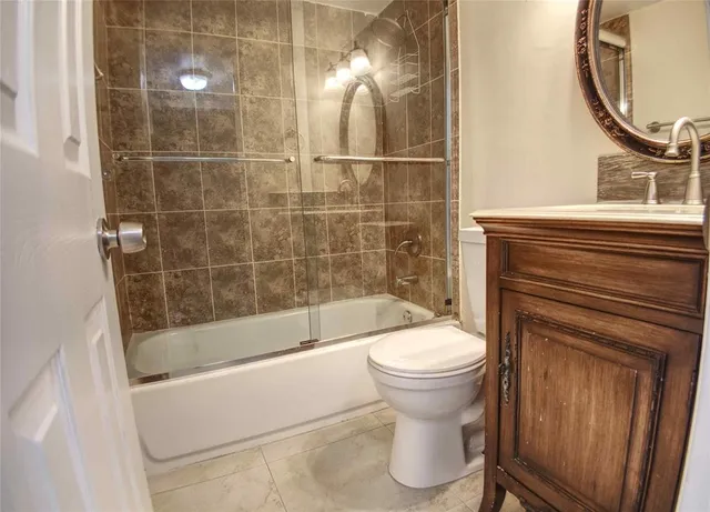 a view of a kitchen with appliances and cabinets