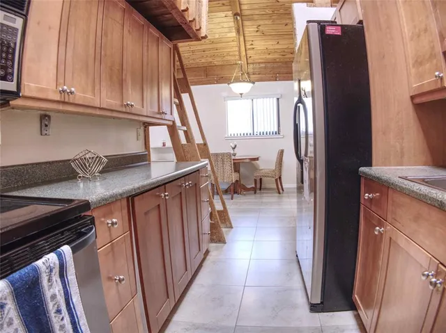 a kitchen with granite countertop a sink and a granite counter tops