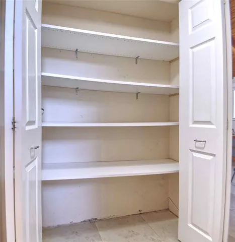 a view of a bedroom with front door