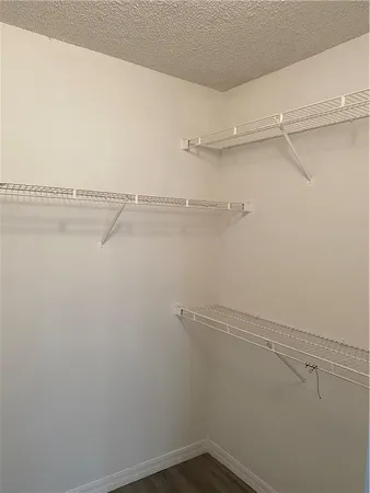 a view of small space with racks on the wall